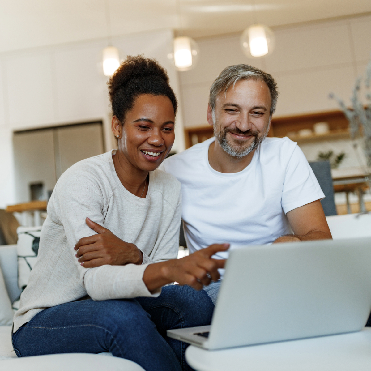 Couple watching mbtv at home