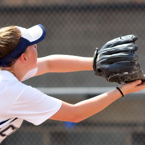 girl playing softball