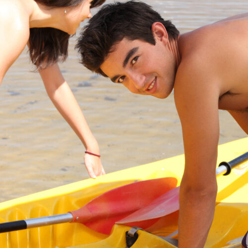 Kid Launching a kayak
