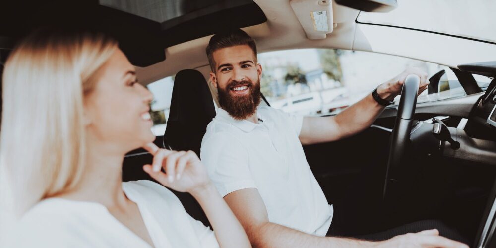 Couple inside a car